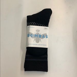 10 pair of small black bomba socks